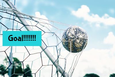 soccer ball into goal